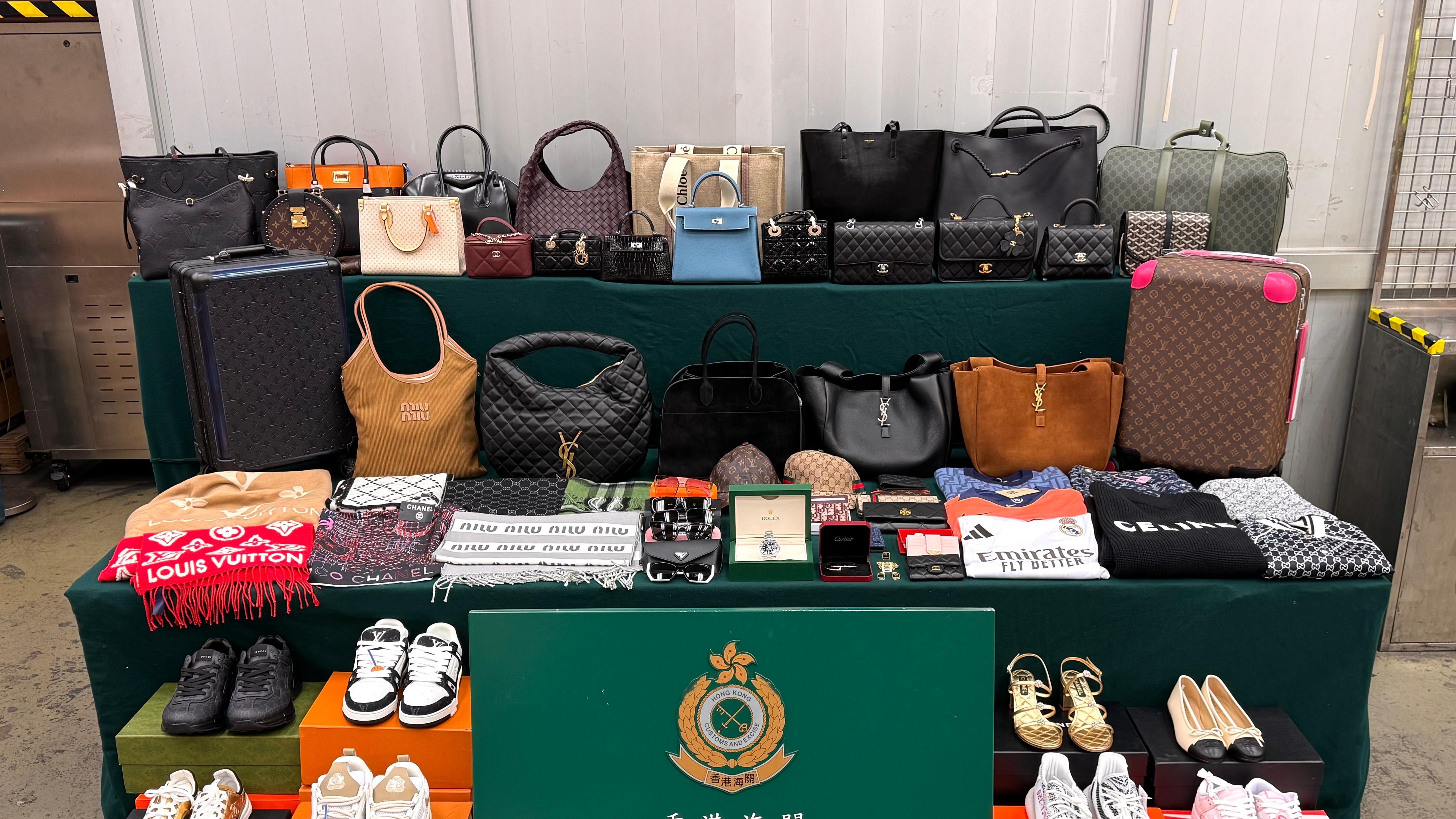 杜拜進口空運貨藏冒牌物品，海關機場檢480萬元服飾鞋具。(政府新聞處)
