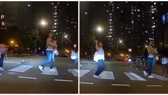 鴨脷洲海怡半島一位女童跟隨大人過路，有禮地向司機鞠躬及揮手一刻被車Cam拍下放上社交平台。(Threads)