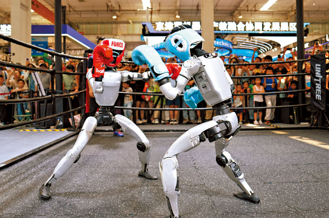 張雲明指未來人形機械人將由舞台及賽場上出現，轉向在家庭及工廠應用。(新華社)