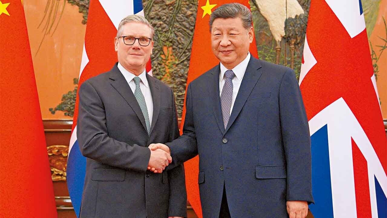 習近平與施紀賢會談超過1小時，兩人又一起午餐談足球。(路透社)