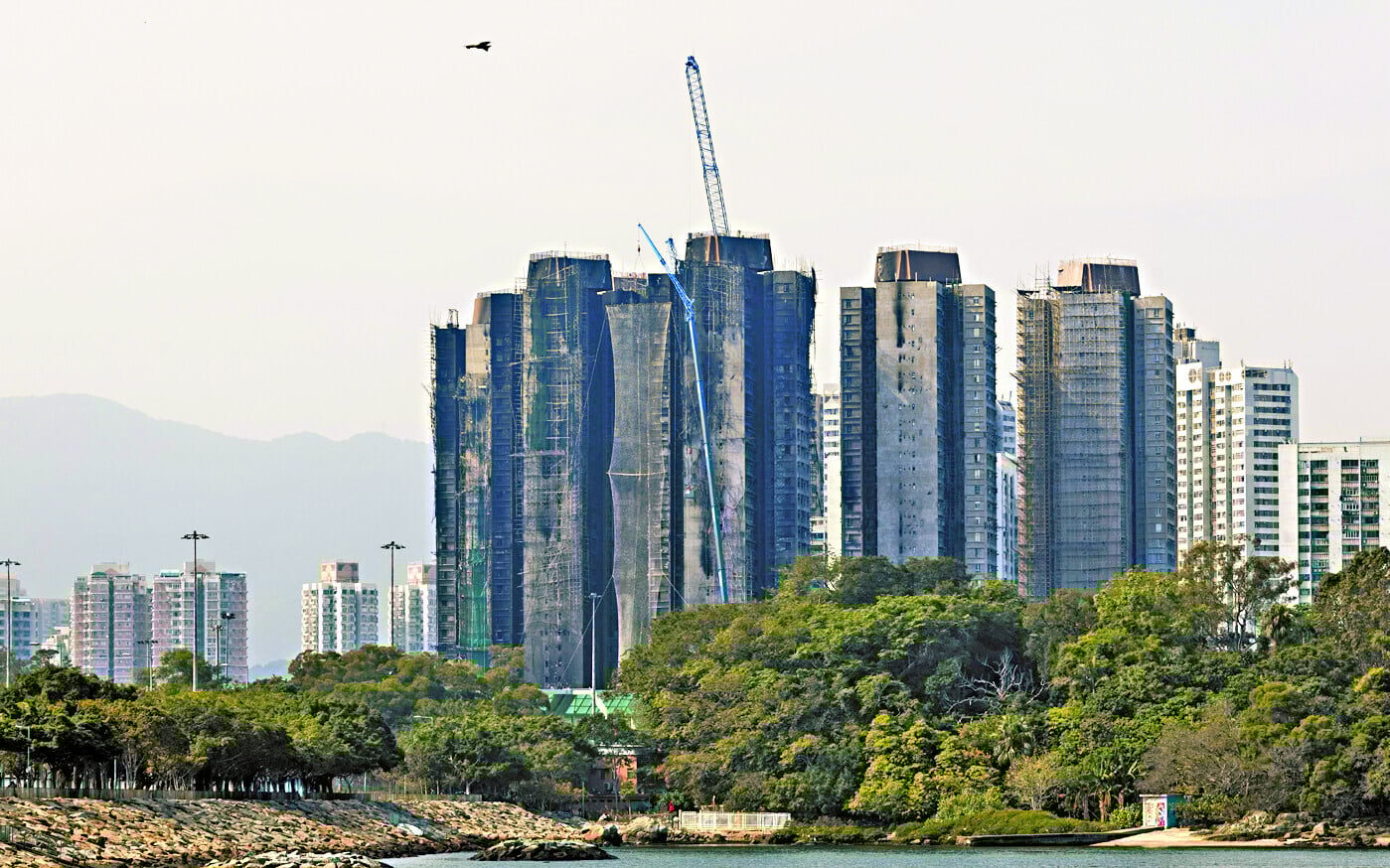 李家超指有相當高比例的業主考慮接受政府收購業權。(資料圖片)