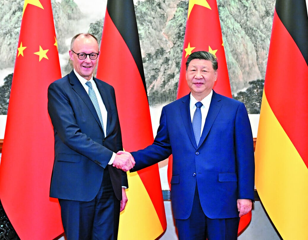 習近平接見默茨。(新華社)