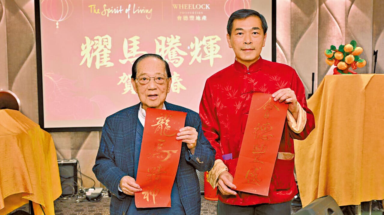 會德豐地產主席梁志堅(左)稱，樓價今年料升8%至10%；右為黃光耀。