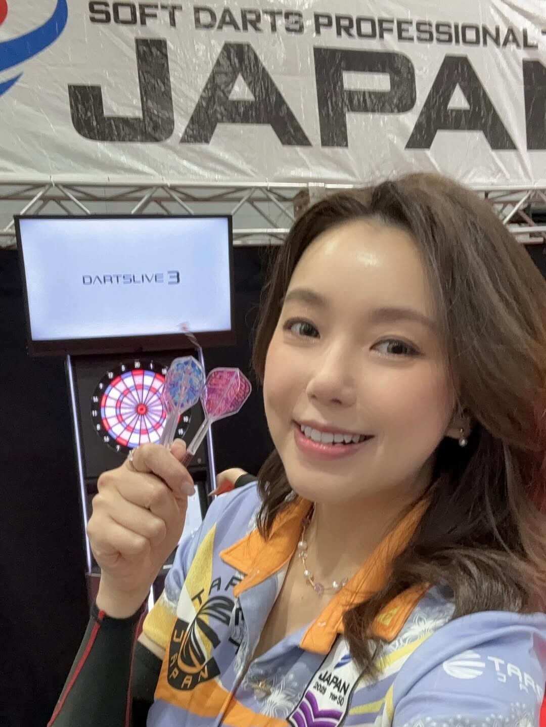 現年40歲嘅梁雨恩(Cathy)淡出娛樂圈轉型飛鏢選手多年