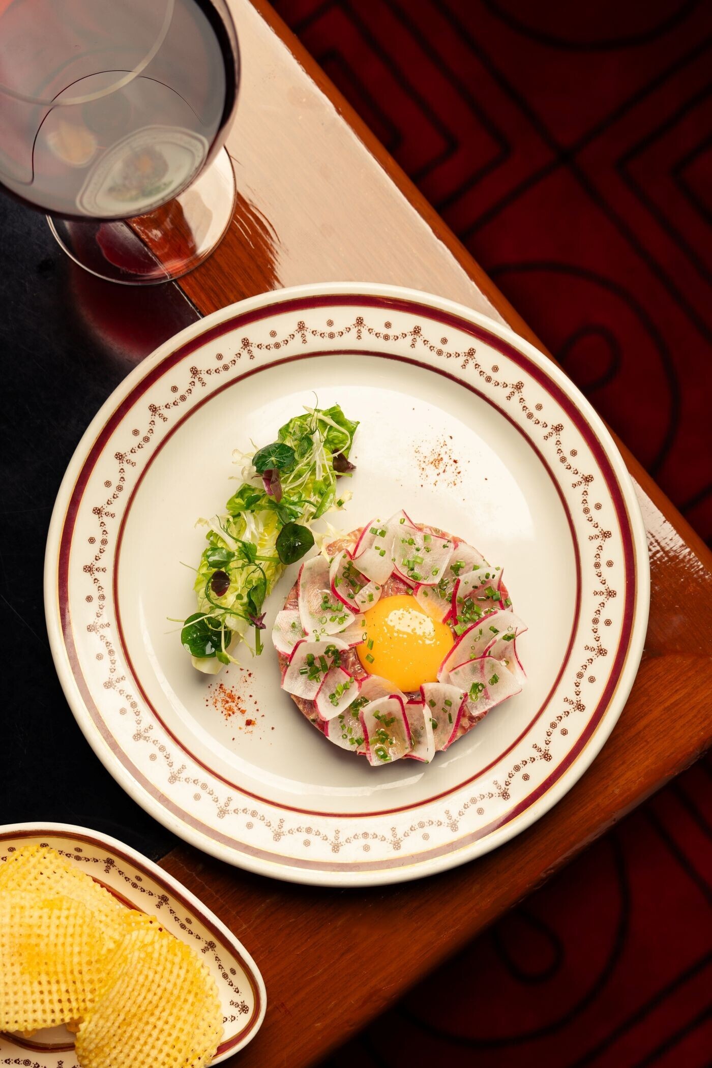 Classic Black Angus Beef Tartare with Confit Egg Yolk, Baby Gem Salad and Gaufrette Potatoes 1