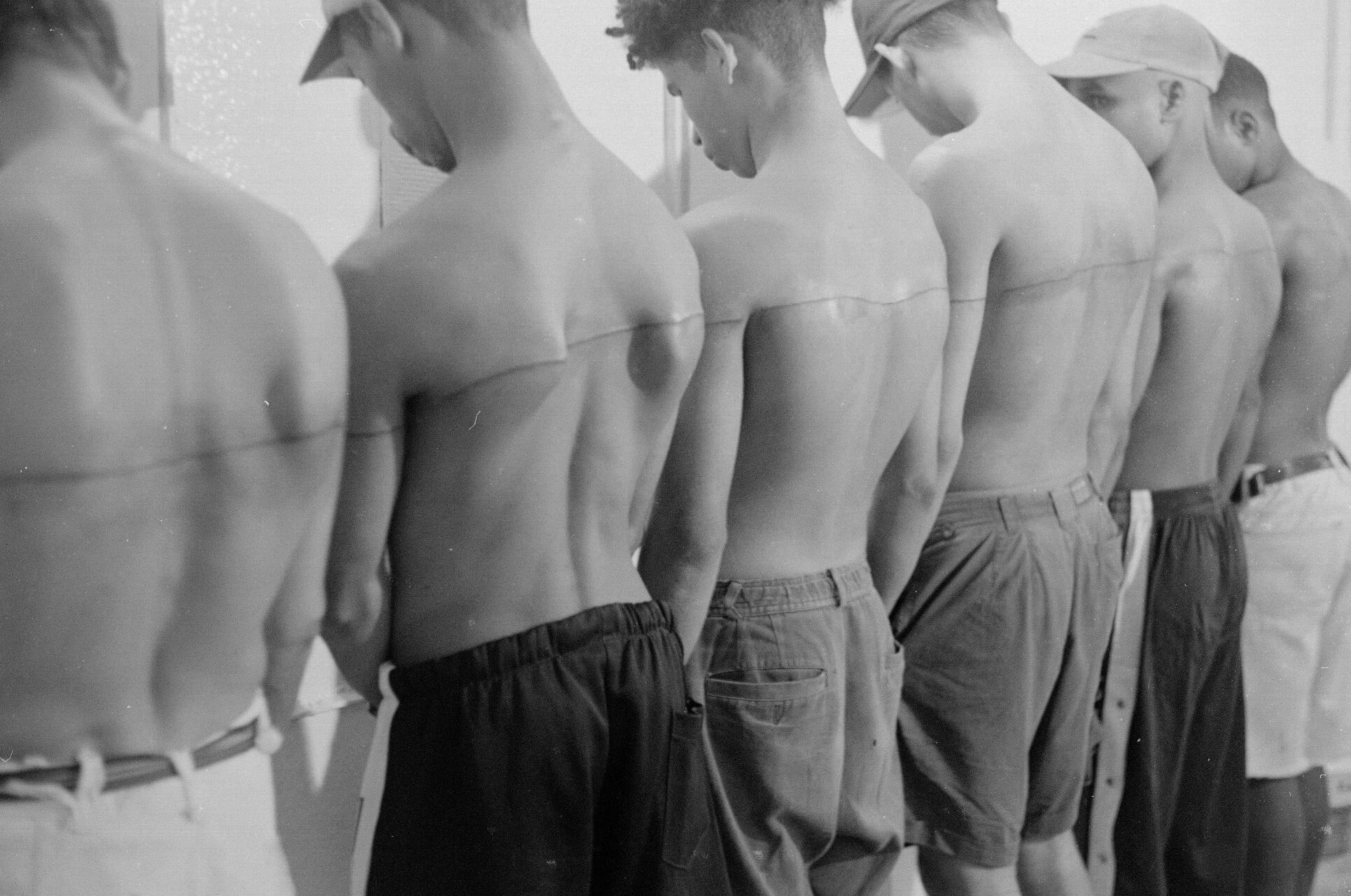 Santiago Sierra 250 cm Line Tattooed on Six Remunerated People. Image courtesy of Estudio Santiago Sierra.