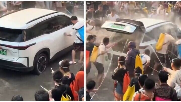 雲南西雙版納潑水節期間出現多宗不當行為事件。有多名民眾強行打開一輛白色私家車車門及後備箱肆意噴水，致使車內被水浸透、機械冒煙故障死火。(影片截圖)