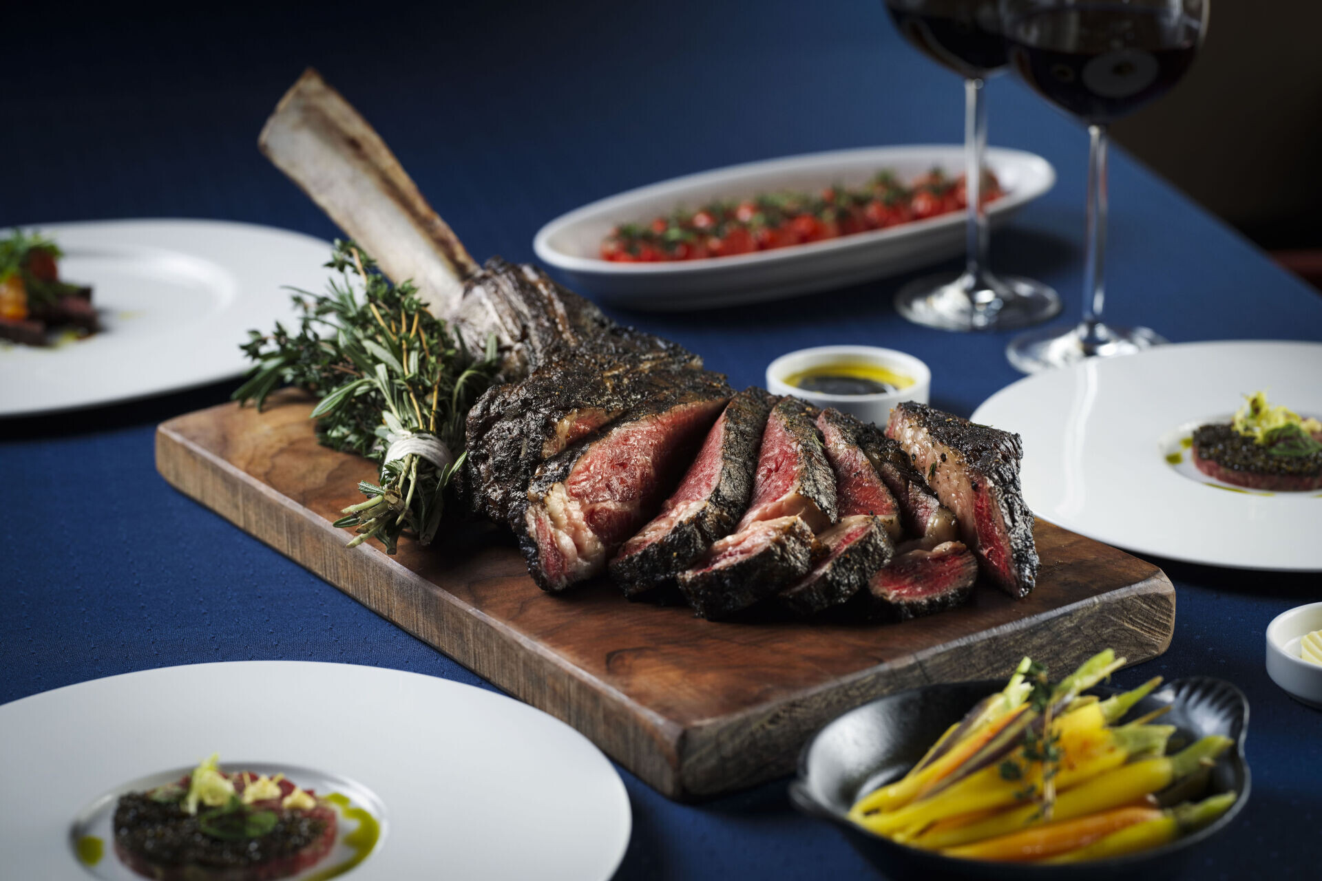 Oyster & Wine Bar Surf & Turf M4 Wagyu Tomahawk Rib Steak