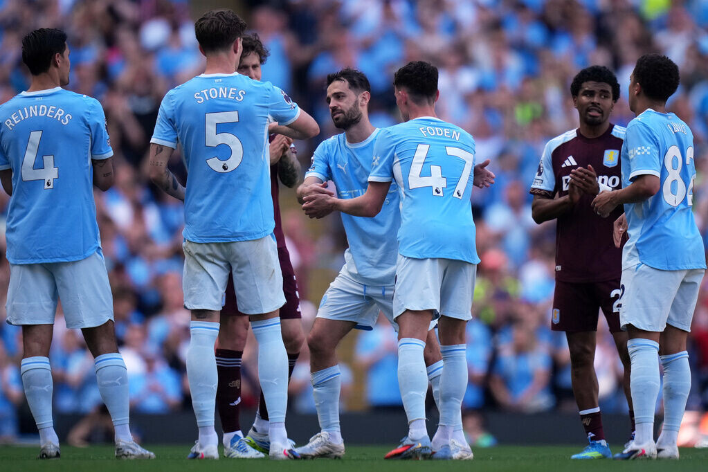哥迪奧拿(Pep Guardiola)、史東斯及貝拿度施華(Bernardo Silva)季後離隊曼城。(美聯社)