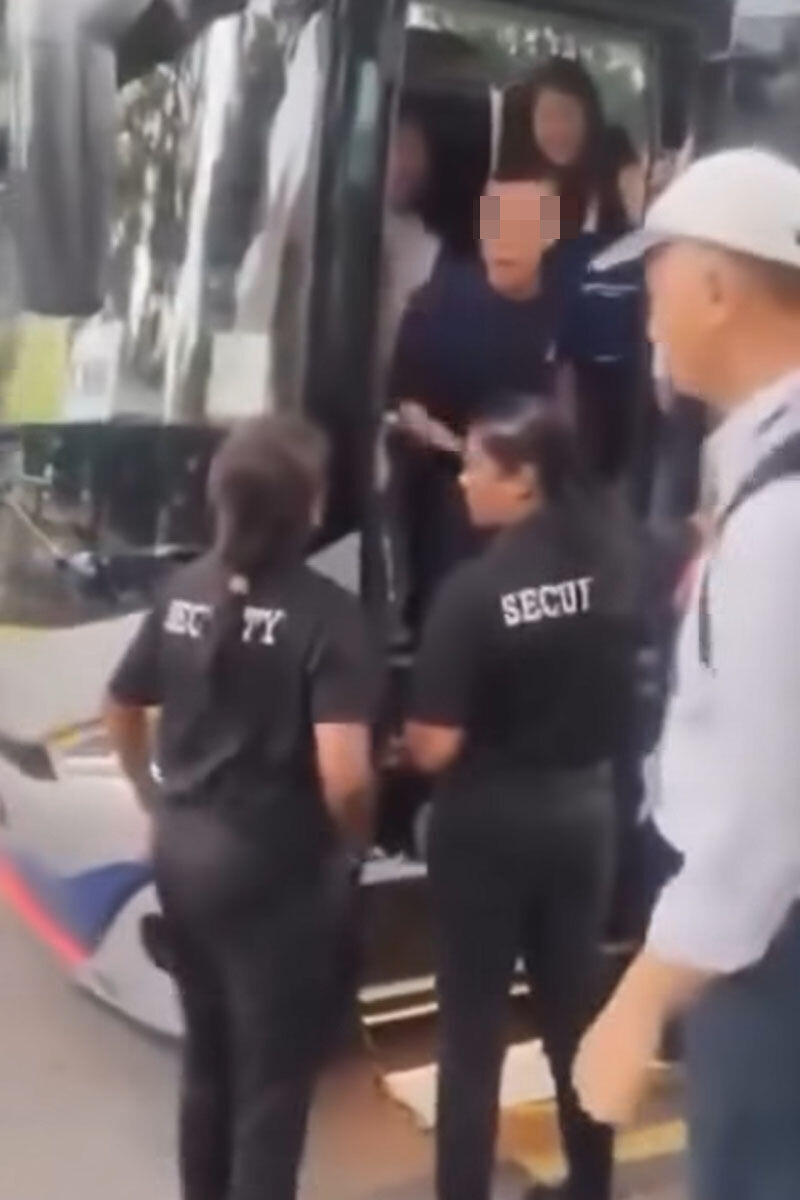 有影片顯示李卓興在新加坡率領交流團期間,與當地保安口角並爆粗指罵。(網上影片截圖)