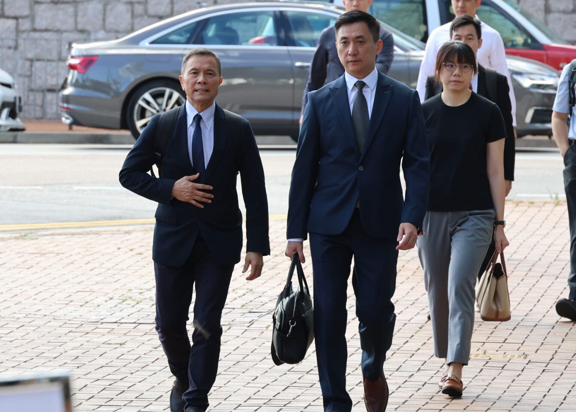 第五輪首場聽證會將傳召專家證人,包括城市大學建築學及土木工程學系建築工程講座教授袁國傑(左)及副消防總長林建軍(右)