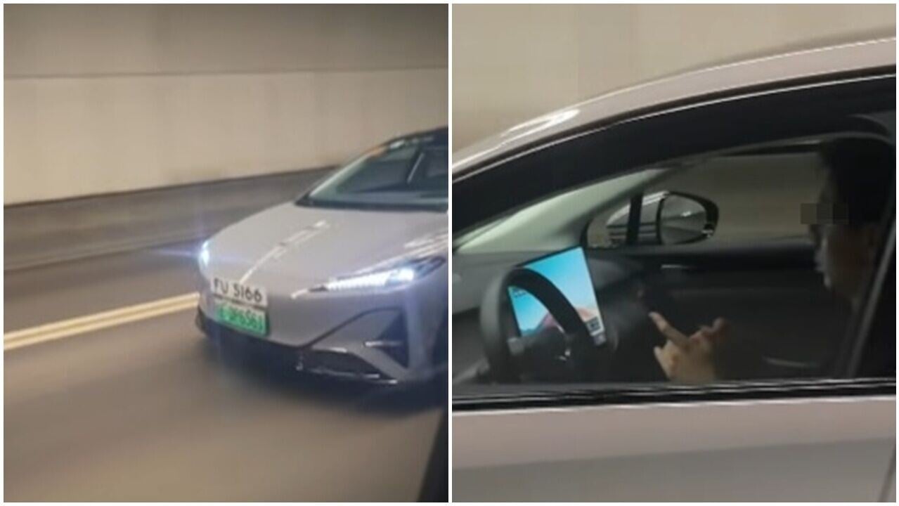 車Cam直擊，FU牌司機駕駛時雙手離軚用手機，網民：馬路核彈。(FB/車cam L (香港群組))