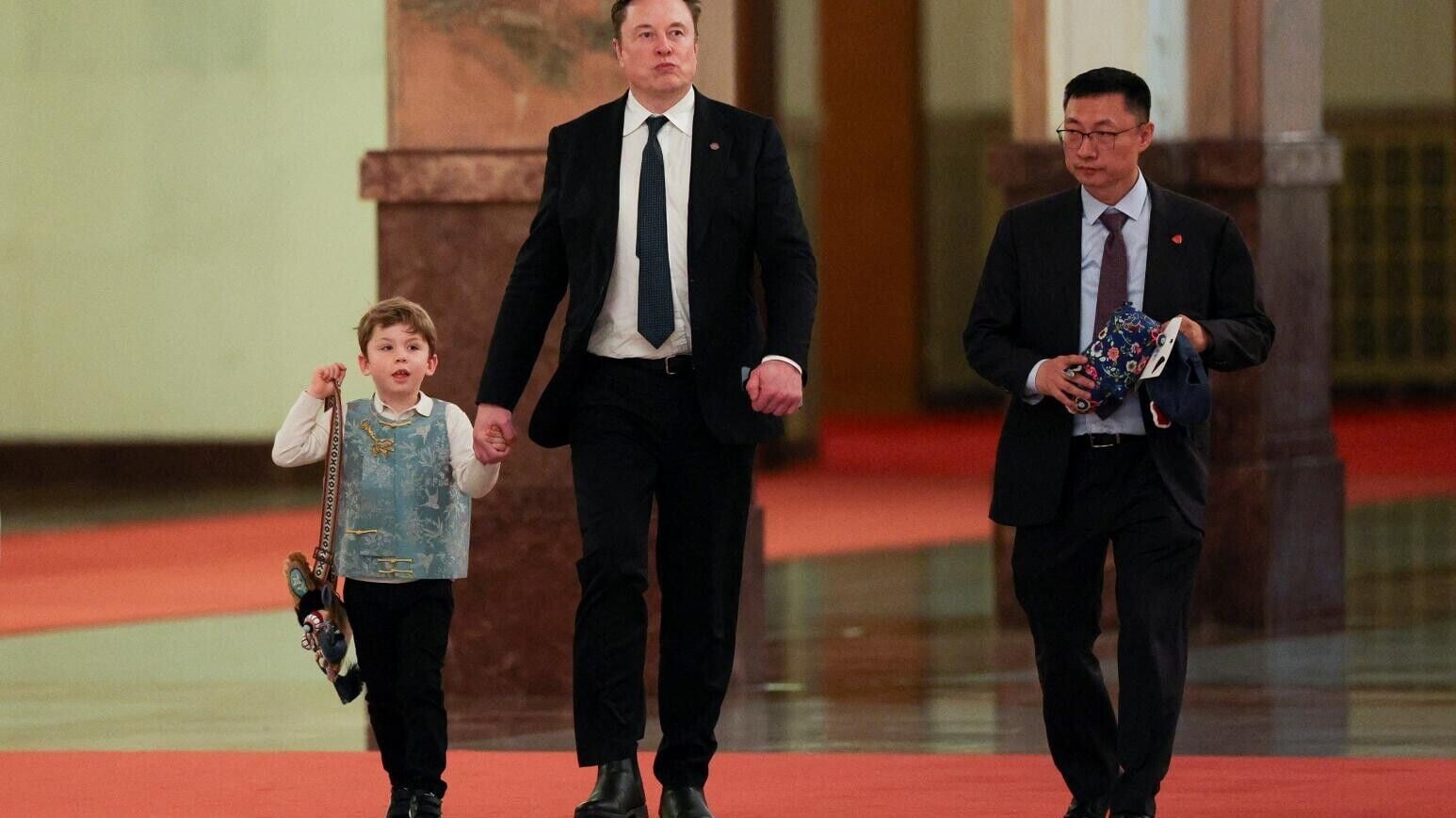 馬斯克（Elon Musk）今年隨特朗普訪華時，與兒子在國宴亮相（資料圖片）