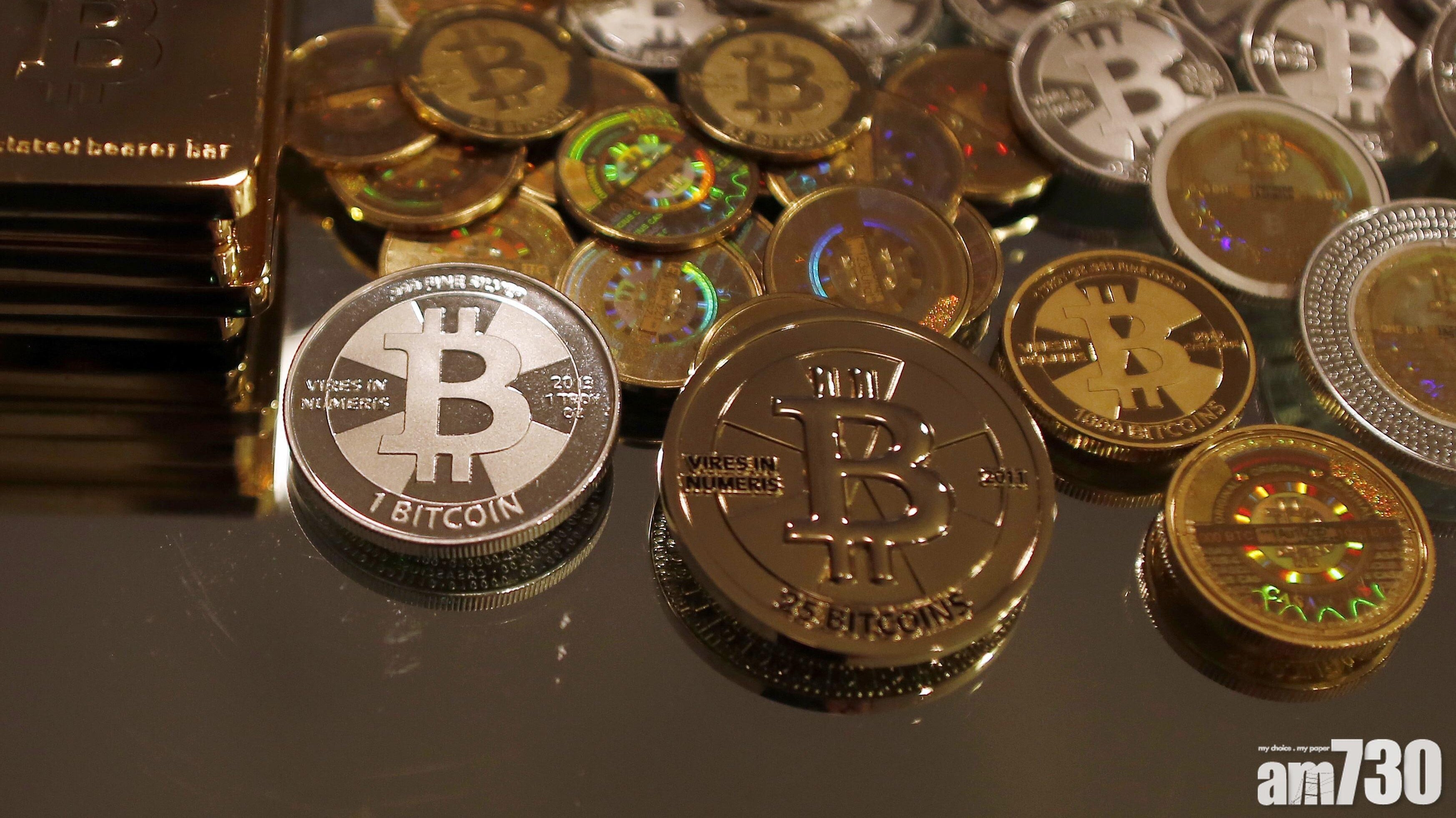 Bitcoin升未比特幣跌穿6萬美元水平。(資料圖片)停  迫向9中東局勢未明朗，以及比特幣大戶Strategy首次沽貨，帶動比特幣下挫。(資料圖片)萬港元