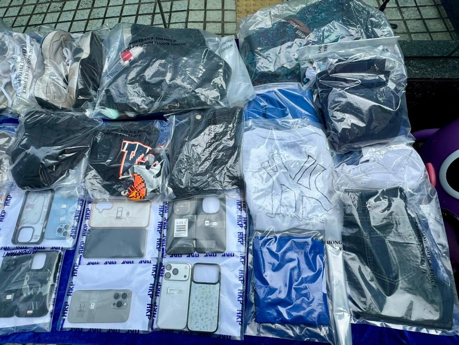 警方拘捕9人,涉及6宗「淋紅油收數」的刑事毁壞案件。