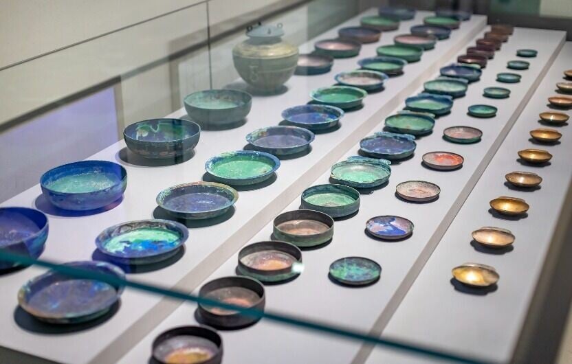 戰國套疊銅餐具,在山東博物館展出,完整陳列59件餐具的種類。(圖片來源:視覺中國)