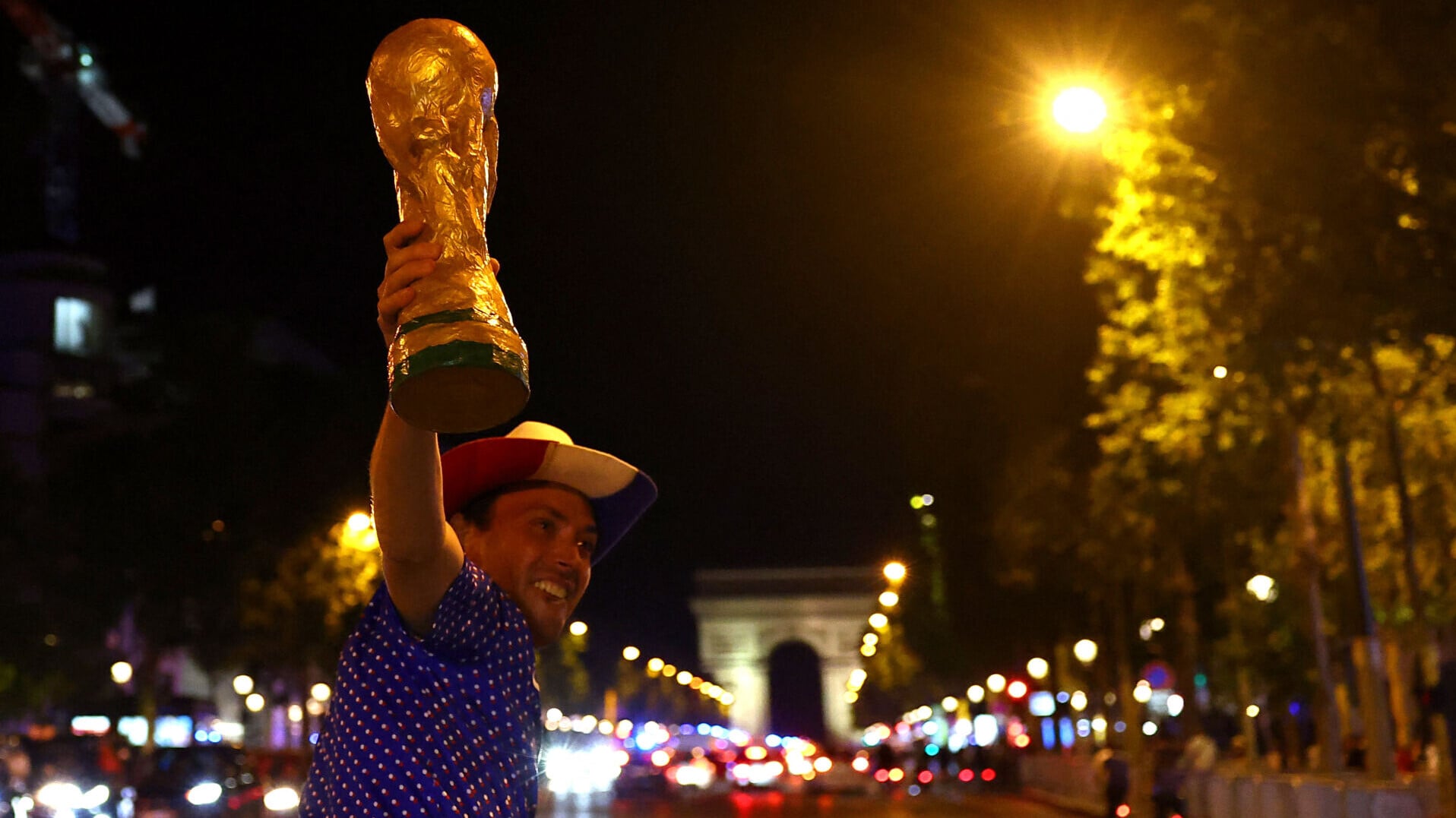 2026 07 09T225641Z 45491604 UP1EM791RQGPC RTRMADP 3 SOCCER WORLDCUP FRA MAR FANS PARIS