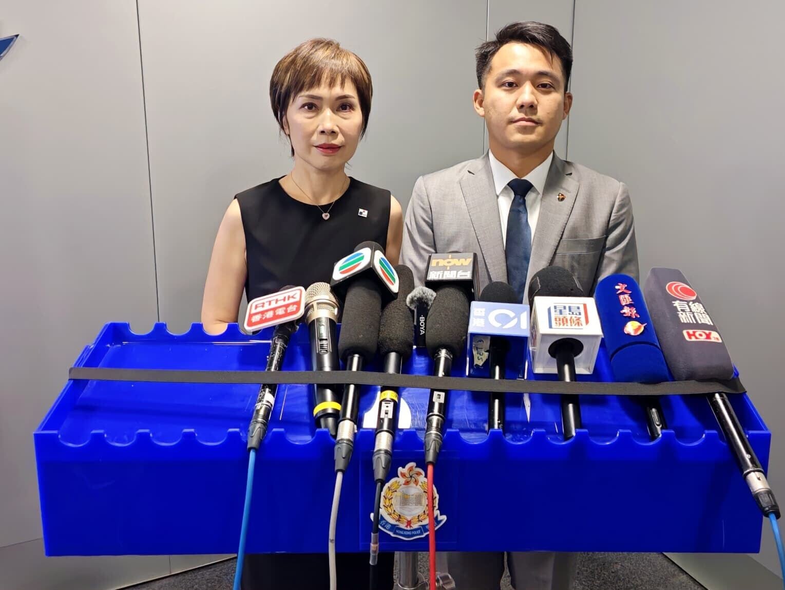 商業罪案調查科訛騙調查組高級督察劉兆寶及香港保險業聯會行政總監劉佩玲。