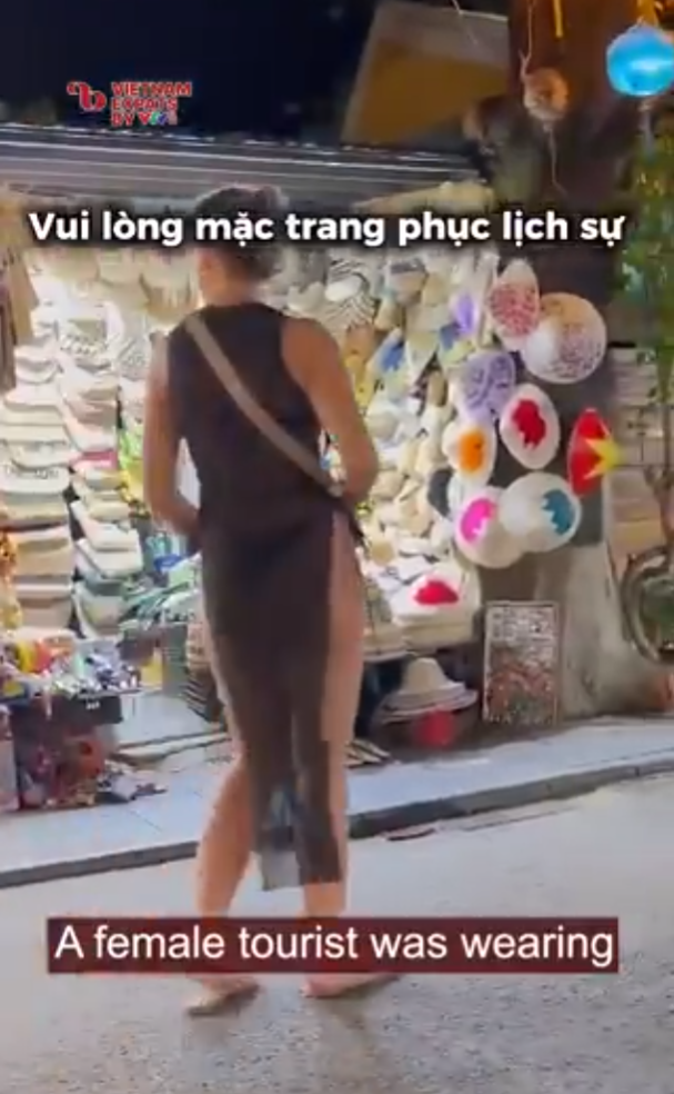 穿透視高衩裙逛越南古蹟