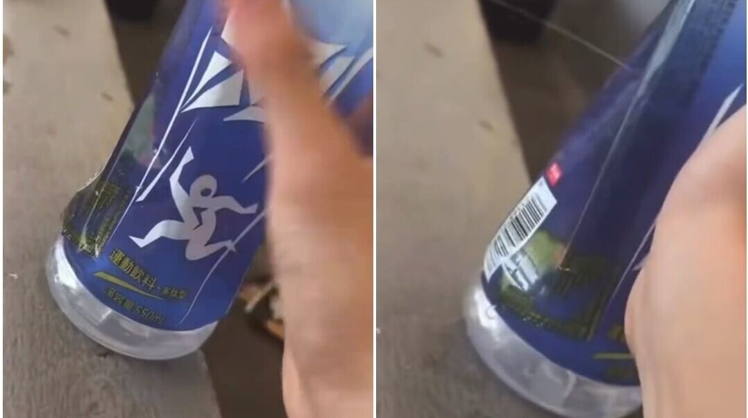 有人向學生派發免費樽裝運動飲品。(網上影片截圖)
