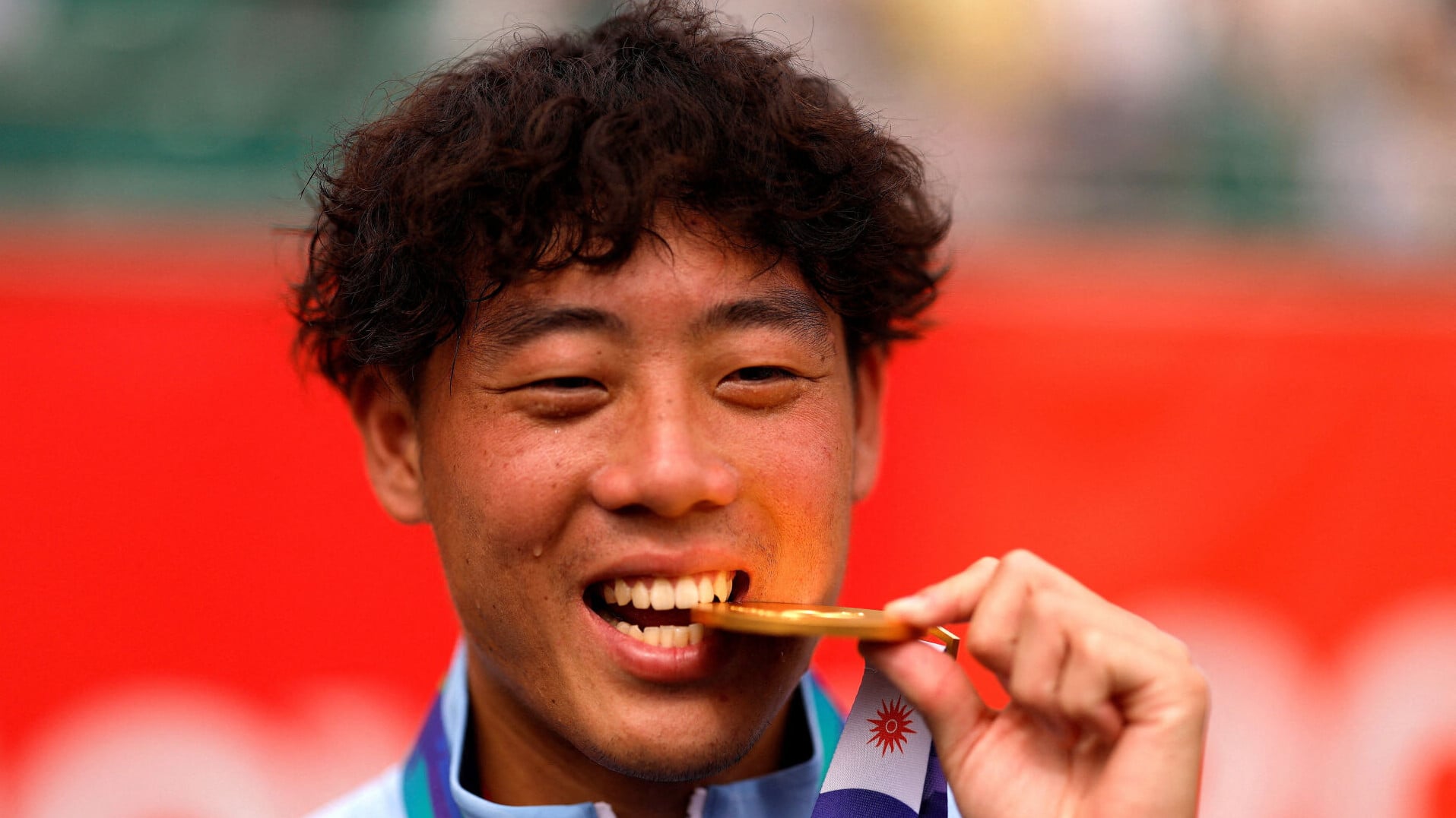 黃澤林創歷史，取得首面亞運網球男單金牌。(路透社)