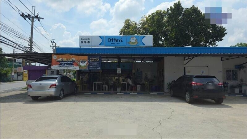 暖武里府涉事自助洗衣店。(X)