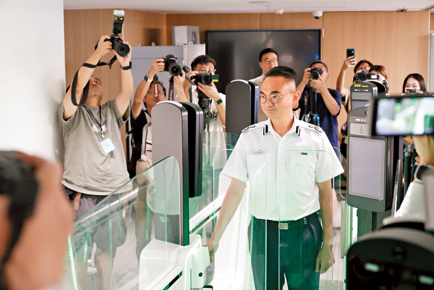 汪奇呼籲香港居民預早登記使用服務。(資料圖片)