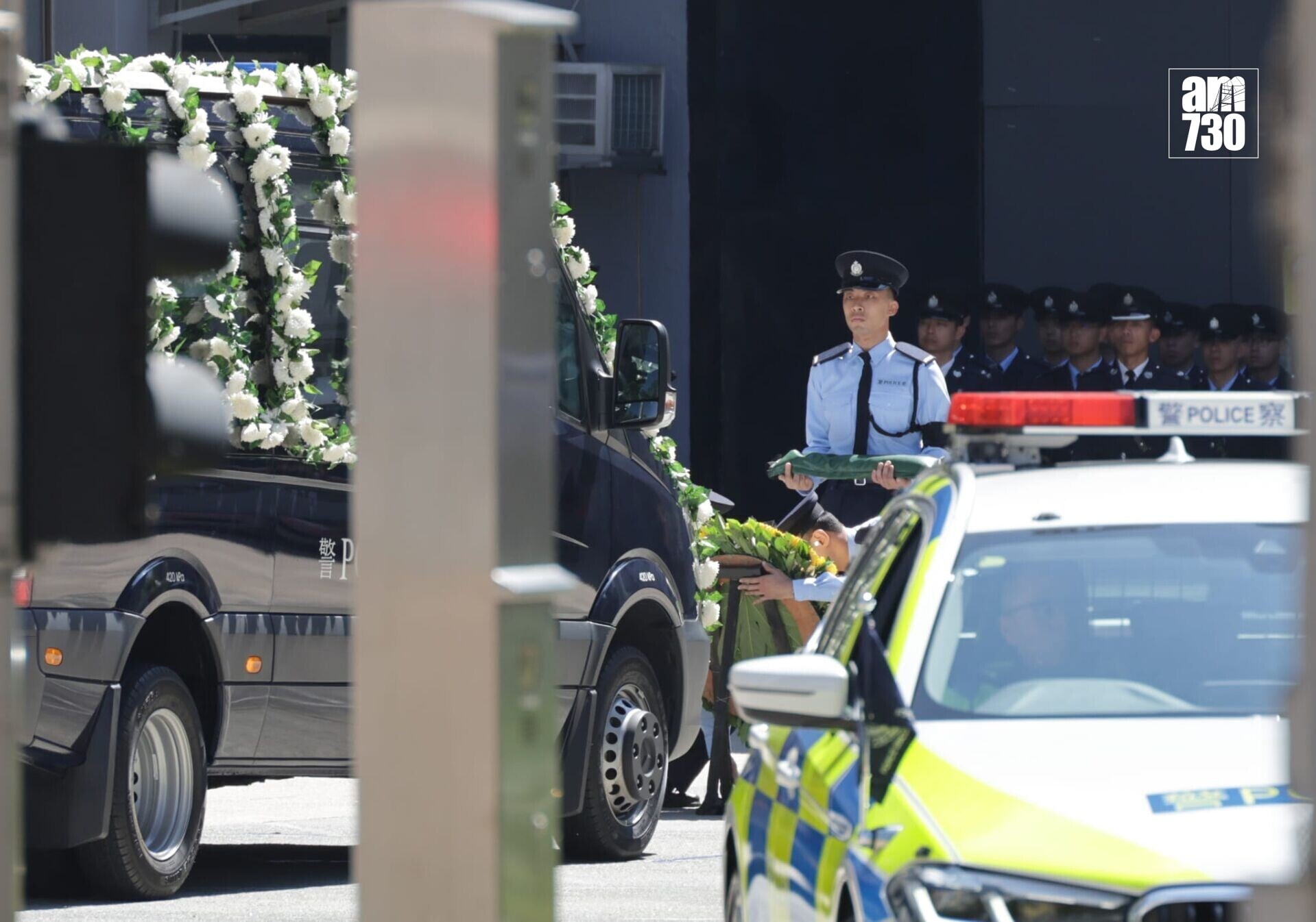 警隊為朱振國舉行最高榮譽喪禮,長沙灣分區警署道別後安葬浩園。(鍾式明攝)