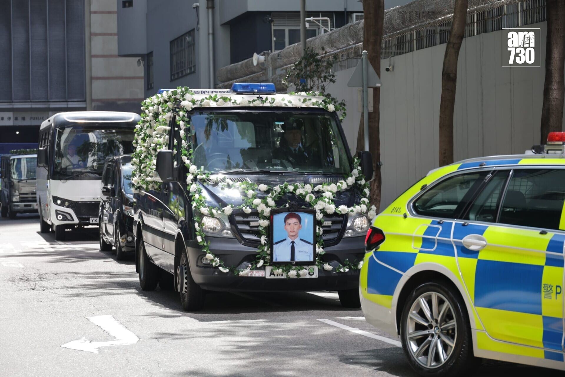 警隊為朱振國舉行最高榮譽喪禮,長沙灣分區警署道別後安葬浩園。(鍾式明攝)