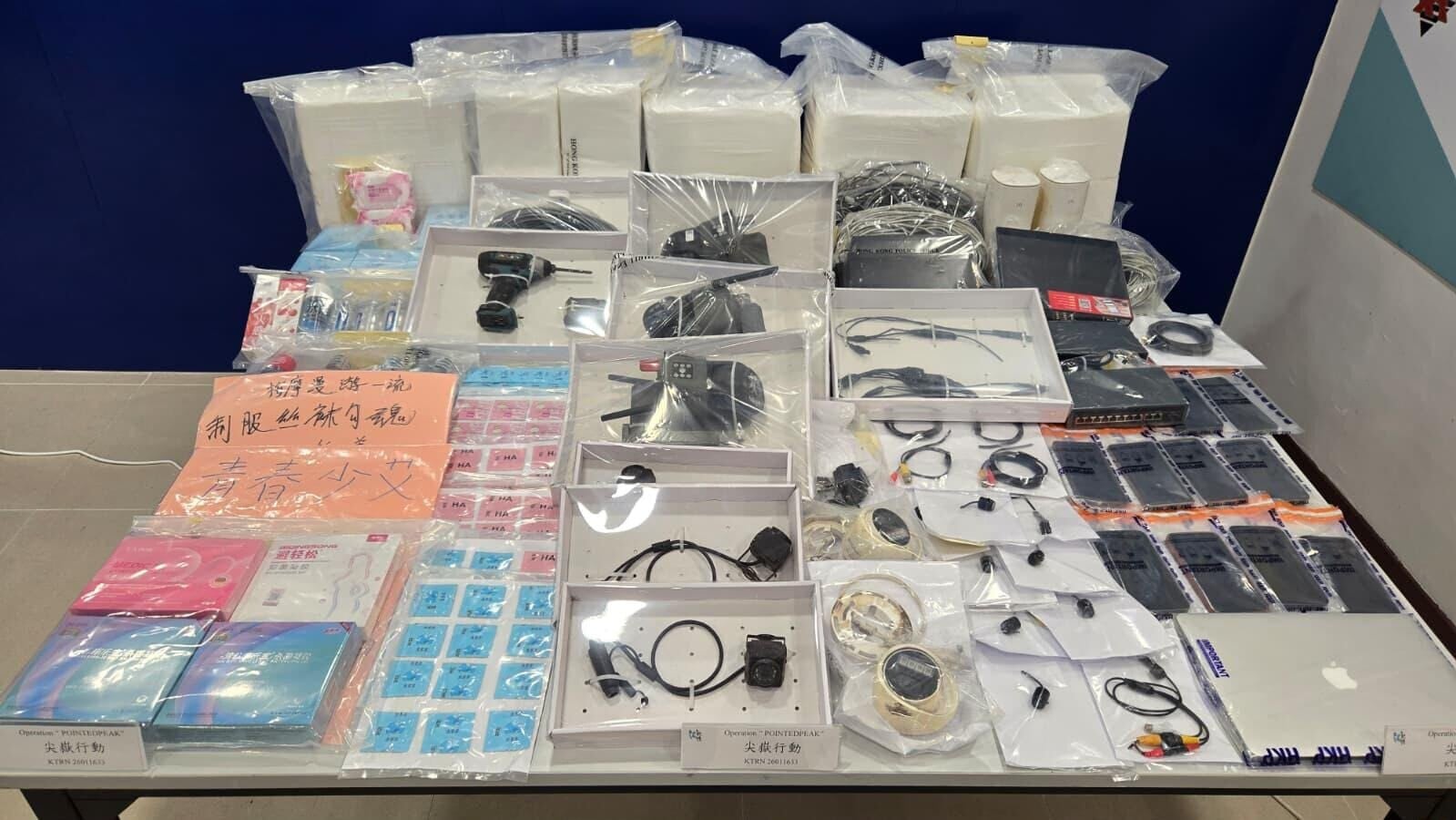 警觀塘搗賣淫集團拘30人,揭街頭裝天眼監視警方避執法。