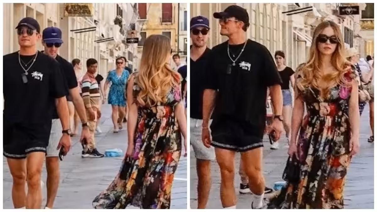 兩人發現記者影相,各自擰開面不直視鏡頭。