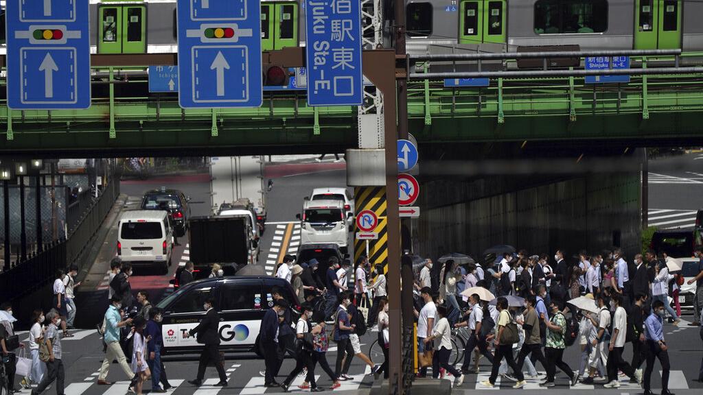 日本逐漸在疫情後復常。(美聯社)