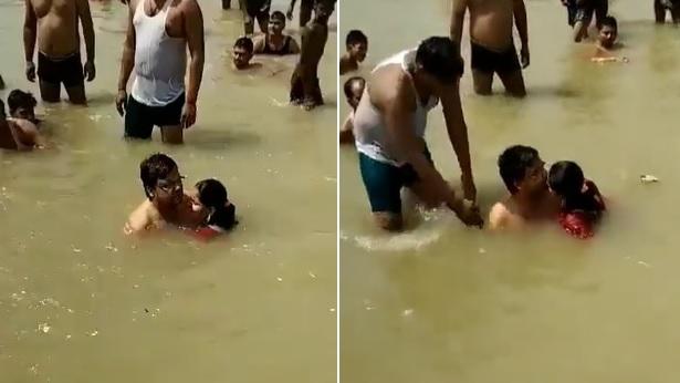 夫婦在聖河相擁接吻，引起旁人不滿。(互聯網)