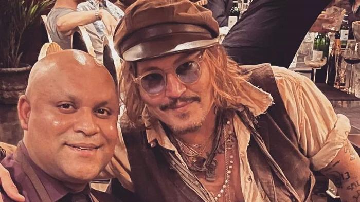 世紀官司｜尊尼花5萬鎊食印度餐 開心合照賀勝訴