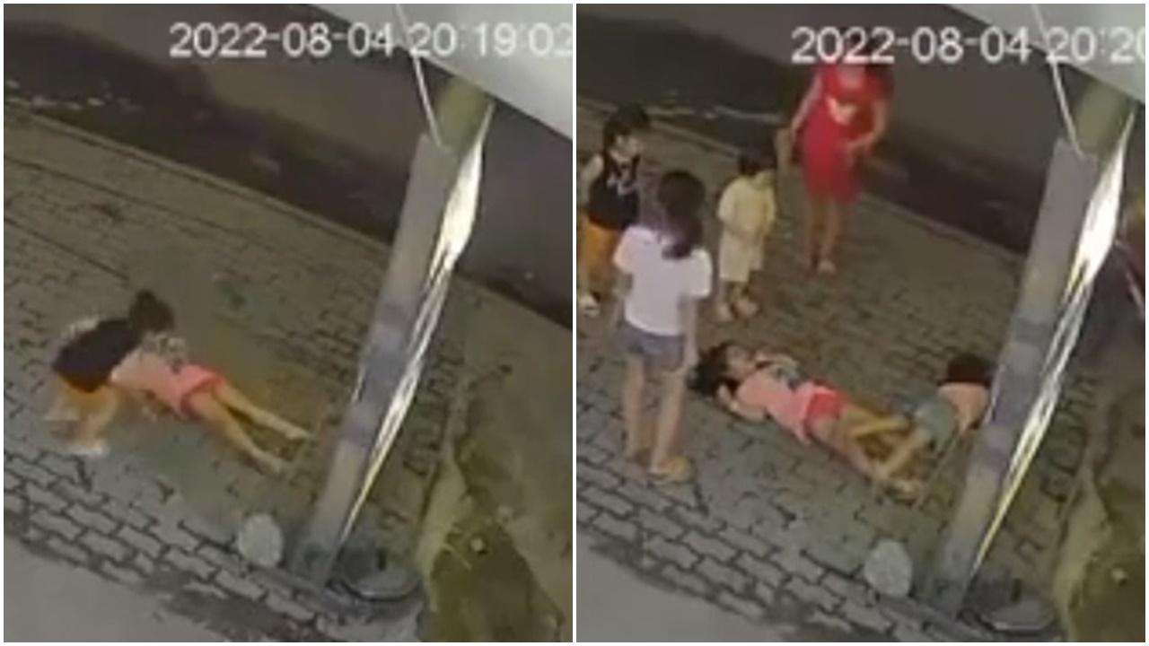 女童觸碰燈箱即倒地，同伴摸一摸亦暈低。(YouTube)