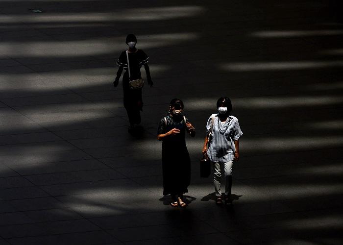 日本東京都未有打算放棄統計確診數字。(路透社)