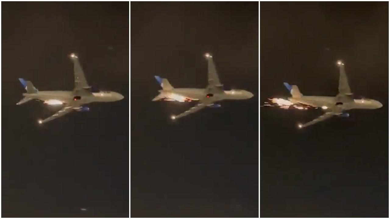 美聯航夜空冒火跌碎片，256人驚險折返。(Twitter)