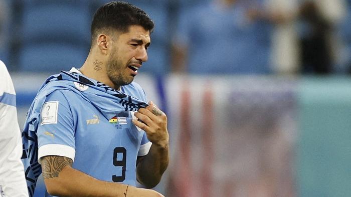 蘇亞雷斯雖然未能獲勝，但仍祝賀老友美斯奪冠。(路透社)