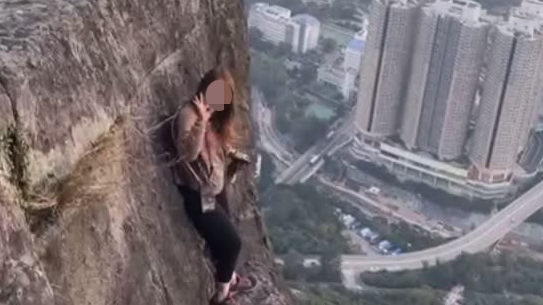 網上熱話｜女子徒手攀自殺崖拍片打卡 網民狠批