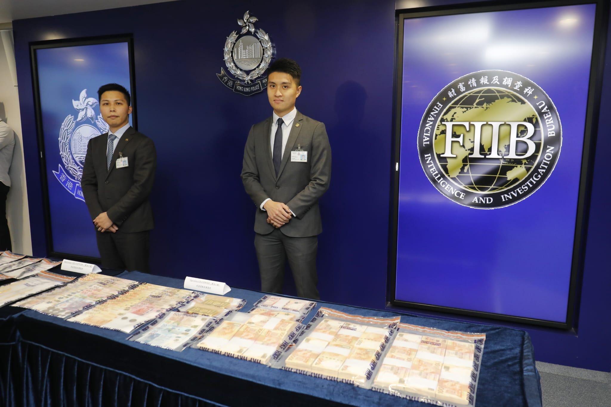 警方與內地中心搗破跨境洗黑錢集團，拘捕11名男子，並檢獲證物。(林俊源攝)