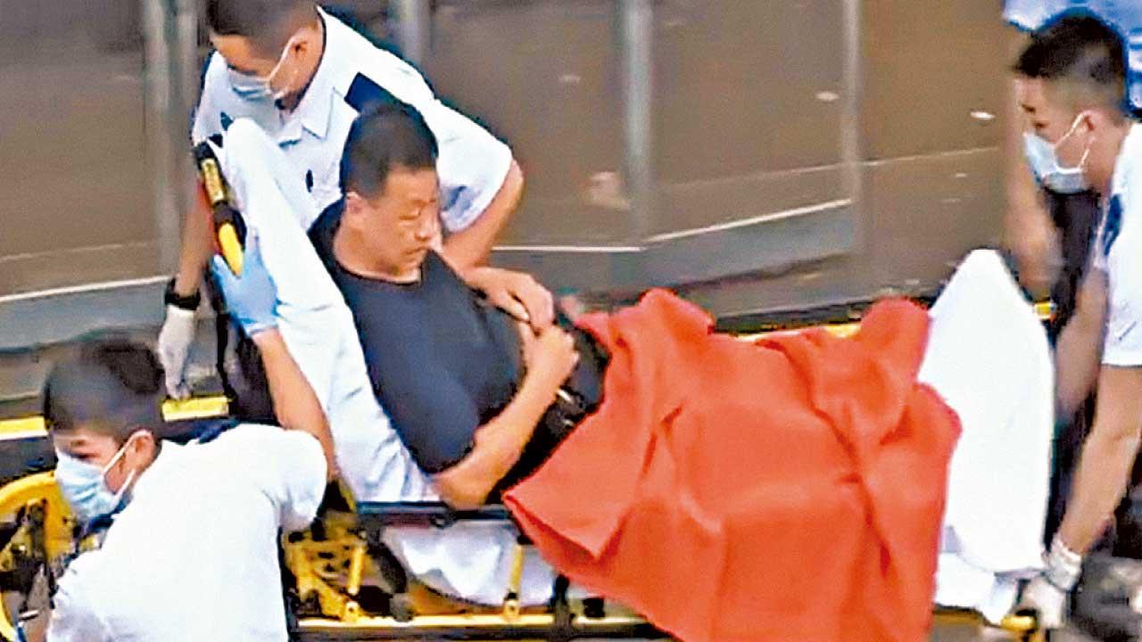 旺角道大廈突降「石屎雨」擊中貨車 司機受傷送院 幸未釀巨災