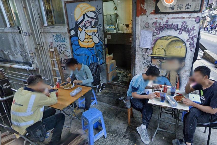 港區國安法｜快餐店逾10年「黃帽工人」塗鴉　被指涉違《國安法》遭抺去