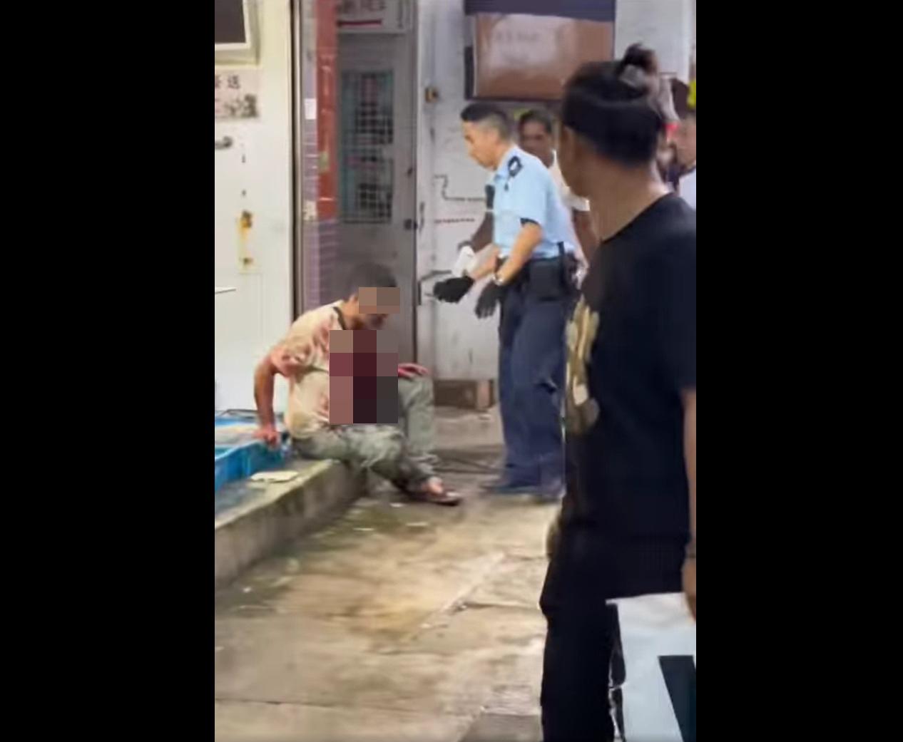 深水埗發生持刀傷人案 男子持菜刀襲擊兩名人士 (@fb 香港突發事故報料區/反斗星影片截圖)