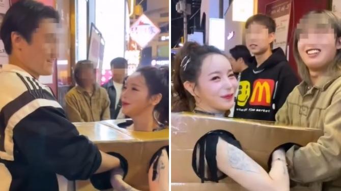 女優任路人伸手入紙箱觸摸身體，男男女女都玩得開心。(互聯網)