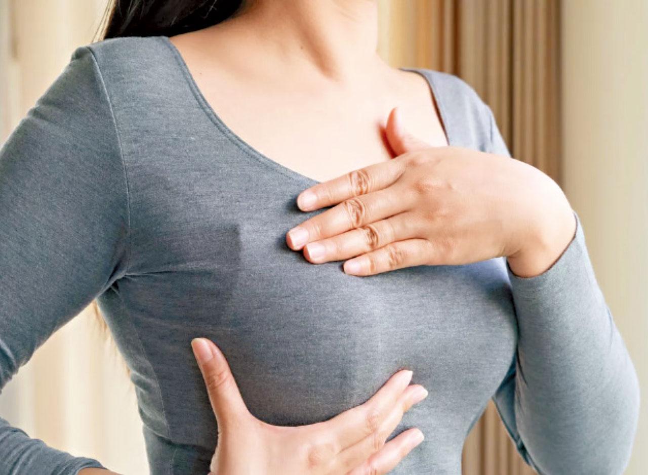 無痛硬塊及乳房紅疹 乳癌先兆