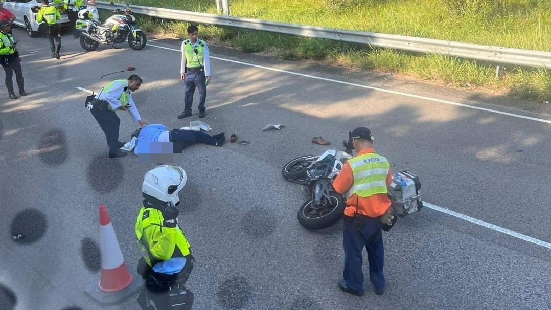 電單車司機受傷倒地，倒臥路中。(馬路的事討論區@fb圖)