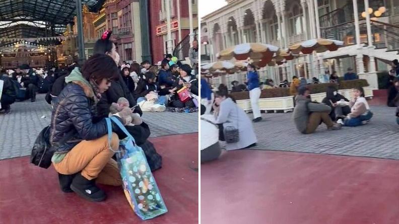 地震後，東京迪士尼樂園裡的遊客以蹲下或坐下的方式避難。(互聯網)
