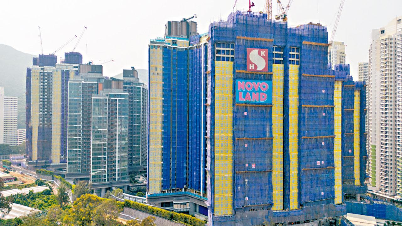 新地大削中期息24% 郭炳聯看好香港樓市