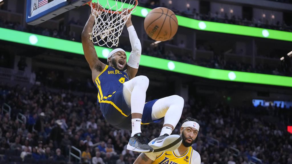 勇士以128:110擊敗湖人。(美聯社)