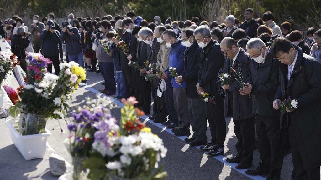 日本悼念311地震。(美聯社)